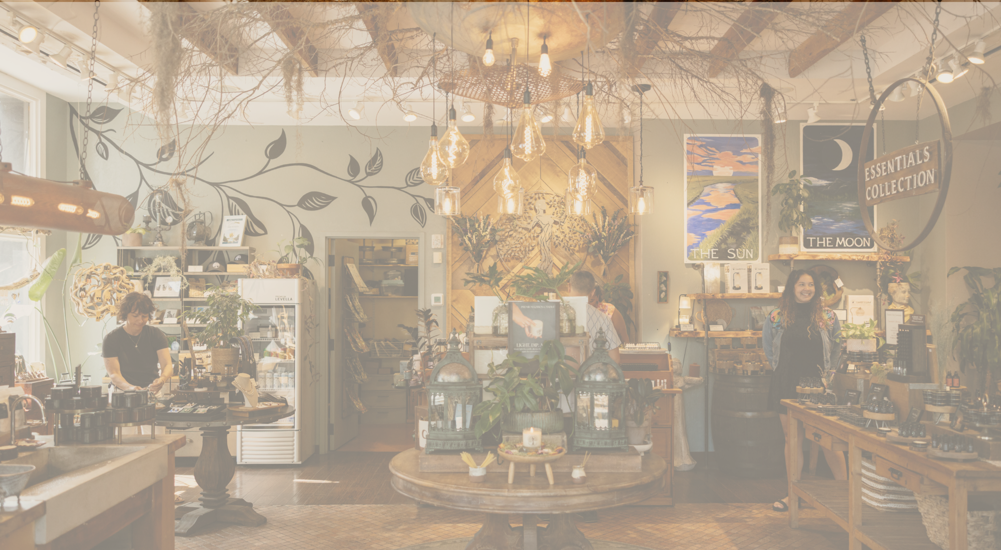 Interior of a store with various products on display, including lanterns and decor items.
